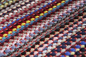 Background, texture of colored handmade carpet