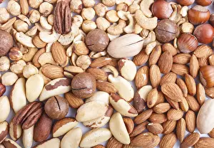 Close Up Hazelnuts Drucke: Background and texture made from different kinds of nuts