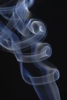 Empty Studio Environment Photo Drucke: Backlit incense with black backdrop