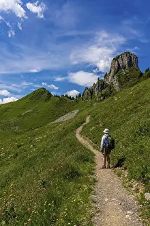 Central European Landscapes Drucke: Backpacker in the Swiss mountains