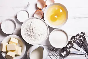 Kitchen Utensils For Baking Drucke: Baking ingredients for pastry on the white table