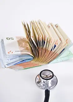Healthcare Cost Drucke: Bank notes and a stethoscope