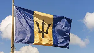 Barbados Flag Drucke: The Barbados flag flutters in the wind