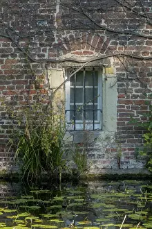 German Federal Republic Architecture Style Drucke: Barred window in brick wall, moat