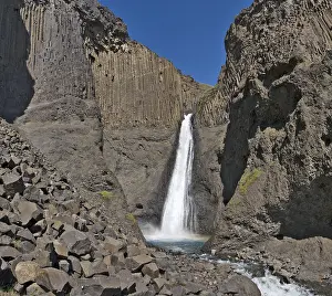 Basalt Columns Drucke: Basalt columns lining Litlanesfoss Waterfall