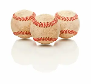 Baseball Equipment Drucke: Three Baseballs Isolated on a Reflective White Background