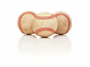 Baseball Equipment Drucke: Three Baseballs Isolated on a Reflective White Background