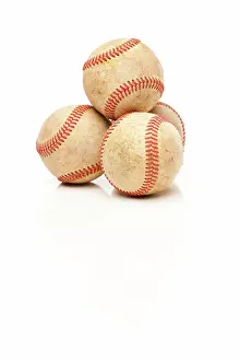 Baseball Equipment Drucke: Four Baseballs Isolated on a Reflective White Background