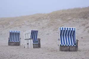 Beach Holiday In Europe Drucke: Empty beach chairs on a sandy beach