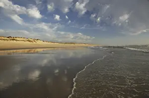 Evening Light In Southern Europe Drucke: Beach and clouds in the evening light