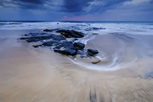 Long Exposure Photography Spain Drucke: Beach with stones, waves and clouds