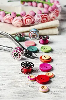 Needlework Supplies Drucke: Beads, thread and bobbins for needlework