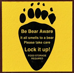 Wildlife Conservation Area Drucke: Be Bear Aware, Warning sign on a bear-proof dustbin