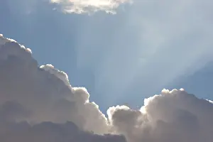 Blue Sky Drucke: Beautiful blue sky with clouds and sun rays