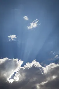 Cloudy Background Drucke: Beautiful dramatic storm clouds with silver lining and light rays with room for your own text or graphics