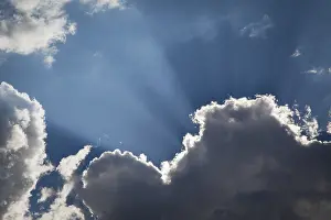 Cloudy Atmospheric Scene Drucke: Beautiful dramatic storm clouds with silver lining and light rays with room for your own text or graphics