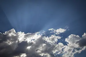 Overcast Weather Images Drucke: Beautiful dramatic storm clouds with silver lining and light rays with room for your own text or graphics