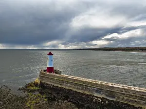 Top Down View Of Pier Drucke: Berwick Pier and Lighthouse from a drone