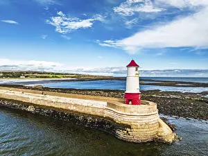 Empty Pier In UK Drucke: Berwick Pier and Lighthouse from a drone