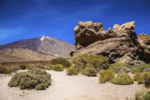 Uninhabited Volcanic Area Drucke: Big volcanic cliff with the mount Teide on the background
