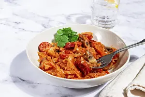 Traditional Polish Cuisine Drucke: Bigos, Polish dish bigos, on a marble table