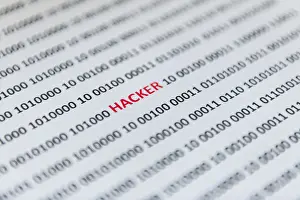 Online Data Transmission Drucke: Binary code with the word hacker, Austria