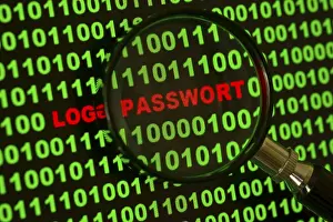 Computer Hacking Crime Drucke: Binary code with the words 'Login Passwort' viewed through a magnifying glass Binary code with the words