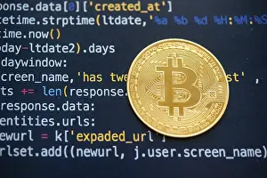 Virtual Money Transfer System Drucke: A Bitcoin coin on top of computer programming code