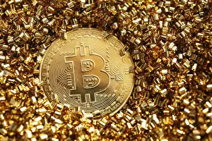 Cryptocurrency Capital Market Drucke: A Bitcoin surrounded by gold particles