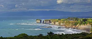 Steep Cliff Coastal Landscape Drucke: Bizarre limestone cliffs of Waterfall Beach at Cape Fallwind