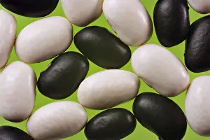 High Angle View Of Vegetables Drucke: Black and white beans, detail