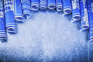 Blue Engineering Drawings Drucke: Blue engineering drawings on metallic background construction concept