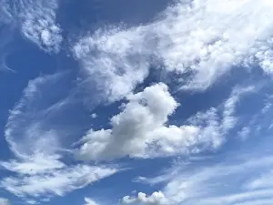 Central Europe Weather Drucke: Blue sky with altocumulus clouds in the centre