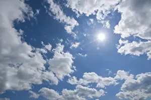 Backlit Germany Landscape Drucke: Blue sky with sun and clouds, Thuringia, Germany