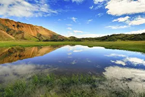Blue Sky Reflection Drucke: Blue sky and white clouds reflected in water surface