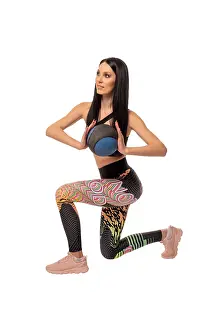 Female Athlete In Studio Shot Drucke: Full body side view of a young