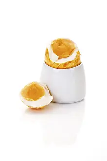 Coloured Easter Eggs Drucke: Boiled breakfast easter egg in an egg cup