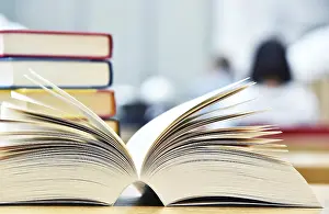 Christian Scripture Images Drucke: Books lying on the table in the public library