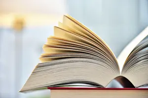 Religious Texts Images Drucke: Books lying on the table in the public library