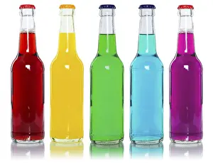 High Calorie Drinks Drucke: Bottles with colourful drinks, in a row
