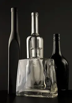 Empty Bottles Drucke: Empty bottles on dark background