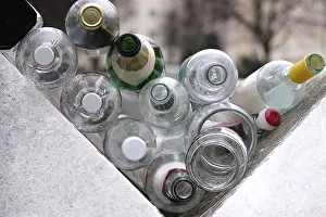 Waste Management Germany Drucke: Empty bottles on a dumpster, Germany