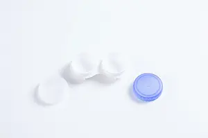 Bright White Background Drucke: Boxes for lenses on a white background