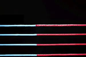 Sportsman In Action Drucke: Boxing ring ropes on a black background