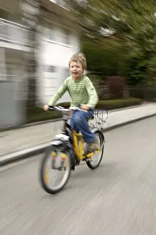 Young Cyclist Drucke: Boy on Bicycle