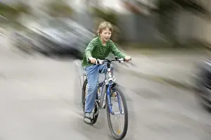 Young Cyclist Drucke: Boy on Bicycle