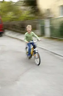 Young Cyclist Drucke: Boy on Bicycle
