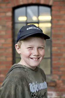 Young Boy Portrait Drucke: Boy with caps