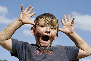 Joy Of Living Portrait Drucke: Boy covered with mud