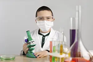 Laboratory Equipment Drucke: Boy laboratory with microscope